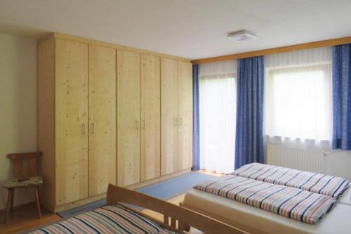 Postel nebo postele na pokoji v ubytování holiday home Emberger, Fügen