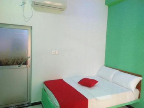 Postel nebo postele na pokoji v ubytování beach life hostal