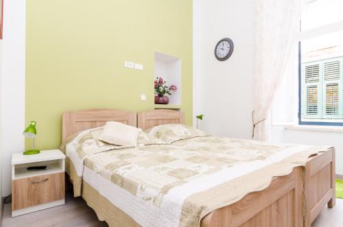 Posteľ alebo postele v izbe v ubytovaní Rooms Tezoro
