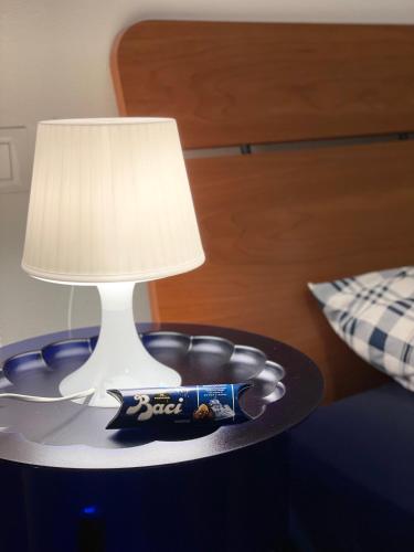 Ένα ή περισσότερα κρεβάτια σε δωμάτιο στο Trionfo your home in Trieste business and holiday stays