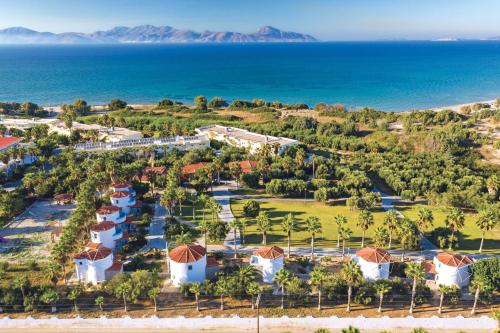 an aerial view of a resort near the ocean at Eurovillage Achilleas Hotel in Mastihari
