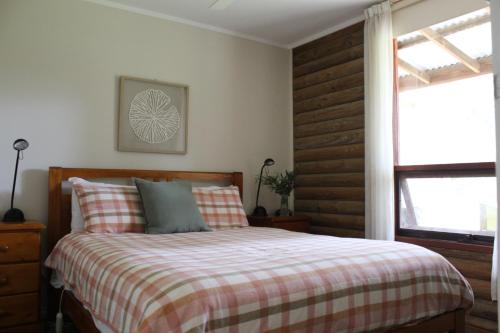 Llit o llits en una habitació de Southern Grampians Cottages