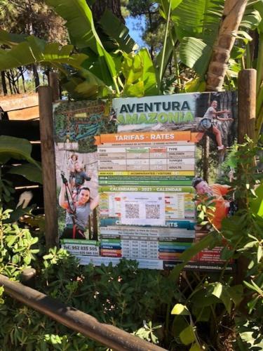 a sign in the middle of a bunch of books at Center beach 2 beds Appartement Elviria in Marbella