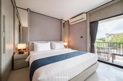 Katil atau katil-katil dalam bilik di Manhattan Pattaya Hotel - SHA Extra Plus