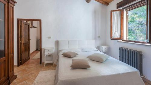 Ένα ή περισσότερα κρεβάτια σε δωμάτιο στο Ca' Paolo 8, Emma Villas