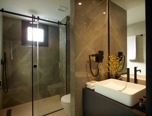 A bathroom at The Port Square Hotel