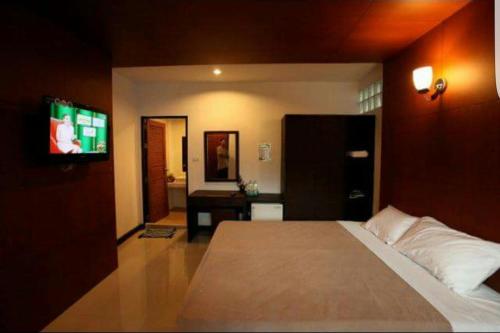 Cama o camas de una habitación en ไทยโฮเต็ล