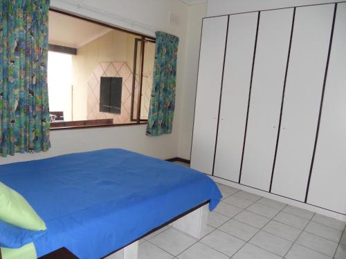 Ein Bett oder Betten in einem Zimmer der Unterkunft Shore Breakers