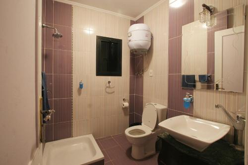 Koupelna v ubytování Arabesque Hotel