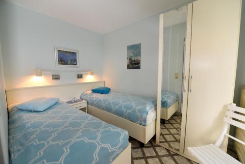 Postel nebo postele na pokoji v ubytování Appartementhaus "Pavillon" Appartement PAV02
