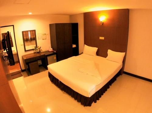 Cama o camas de una habitación en ไทยโฮเต็ล
