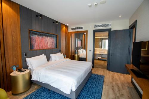 Cama o camas de una habitación en Radisson Blu Hotel & Conference Center, Niamey