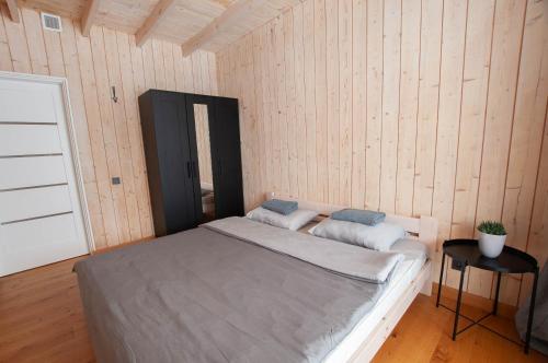 Katil atau katil-katil dalam bilik di Sodybos kompleksas - ECO Resort Trakai