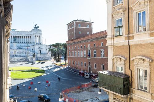 a view of a street in a city with buildings at Amazing Piazza Venezia Suites in Rome
