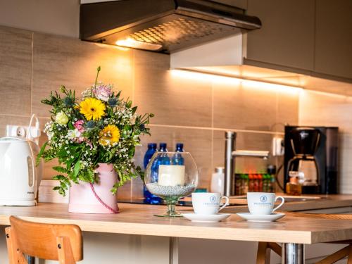 Cucina o angolo cottura di Słoneczna 10a w Jarosławcu Apartamenty nad morzem