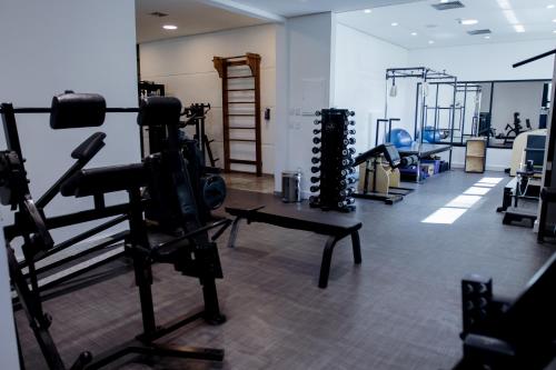 a gym with treadmills and machines in a room at Blue Tree Premium Paulista in Sao Paulo