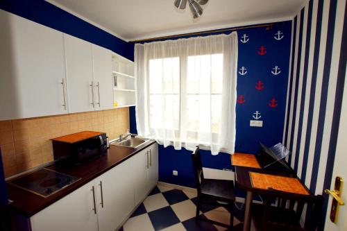Kuchyňa alebo kuchynka v ubytovaní Apartament Rest and Relax