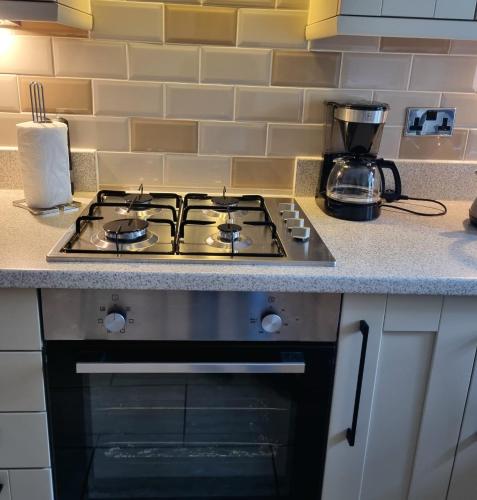 Apartment 11, Mirfield, West Yorkshireにあるキッチンまたは簡易キッチン