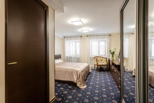 Postel nebo postele na pokoji v ubytování Incognito Boutique Hotel