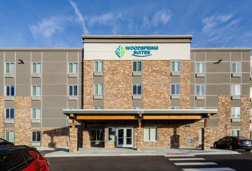 a rendering of the front of a wyncote hotel at WoodSpring Suites Thornton-North Denver in Thornton
