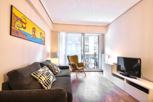 Telewizja i/lub zestaw kina domowego w obiekcie Xuloss Apartments 1