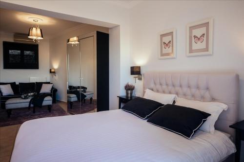 Ένα ή περισσότερα κρεβάτια σε δωμάτιο στο Leto Nuevo Hotel