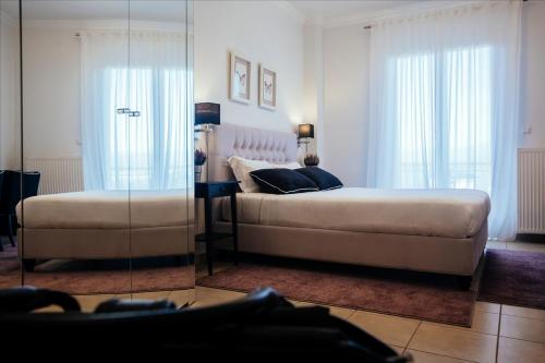 Ένα ή περισσότερα κρεβάτια σε δωμάτιο στο Leto Nuevo Hotel