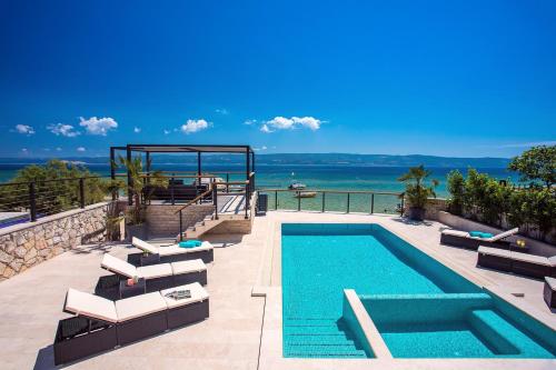 Beachfront Villa Draga with 32sqm private, heated pool, 4 bedrooms, sea view