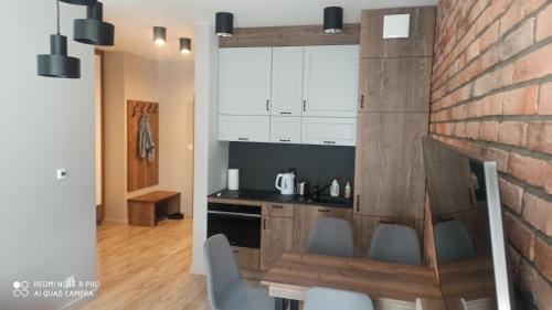 Η κουζίνα ή μικρή κουζίνα στο Apartament SZWED-POL