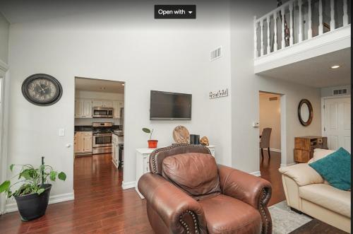 a living room with a couch and a chair at Valencia CA Stunning 3100 +sqft, 5Bed/5Bath home in Santa Clarita