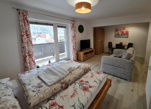 A bed or beds in a room at Apartmán FILIP