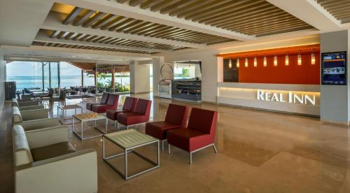 El vestíbulo o zona de recepción de Real Inn Cancún