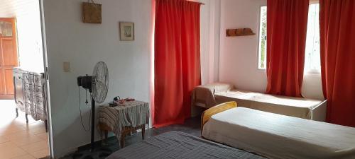 Tempat tidur dalam kamar di Complejo "El Padrino"