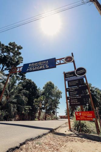 a street sign on the side of a road at NORI POUSADA in São Miguel dos Milagres