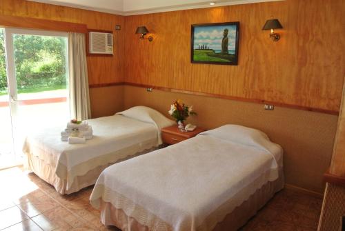Postel nebo postele na pokoji v ubytování Iorana Isla de Pascua Hotel