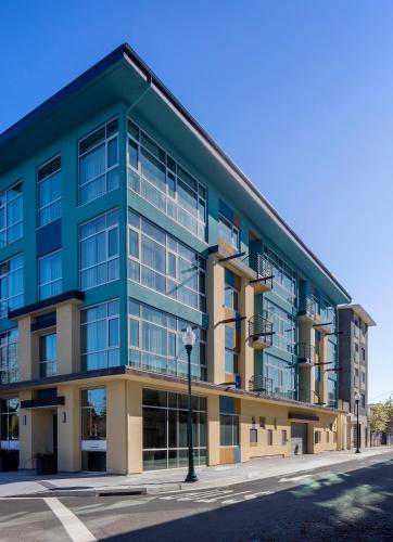 a large blue building with a lot of windows at Art House Hotel in Santa Rosa