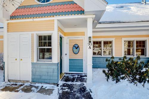 a house with a blue and yellow at The Rest in Jackson