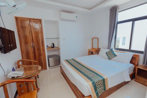 Postel nebo postele na pokoji v ubytování Luxury hotel Phú Yên