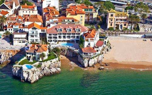 an aerial view of a house on a cliff at The Albatroz Hotel in Cascais