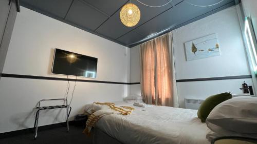 Letto o letti in una camera di Railway Hotel