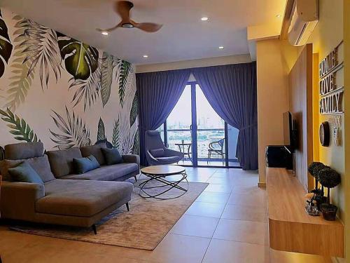 Телевизор и/или развлекательный центр в NEW Condo Atlantis Melaka Town @ Memories