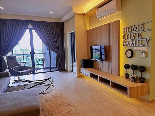 Телевизор и/или развлекательный центр в NEW Condo Atlantis Melaka Town @ Memories