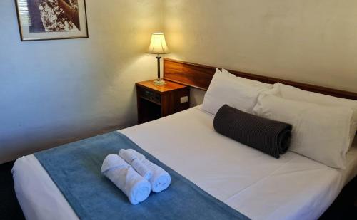 Cama o camas de una habitación en Seaton Arms Motor Inn
