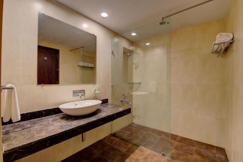 Ett badrum på Khanvel Resort