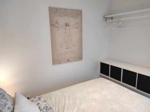 Postel nebo postele na pokoji v ubytování Le Clos de la Commanderie
