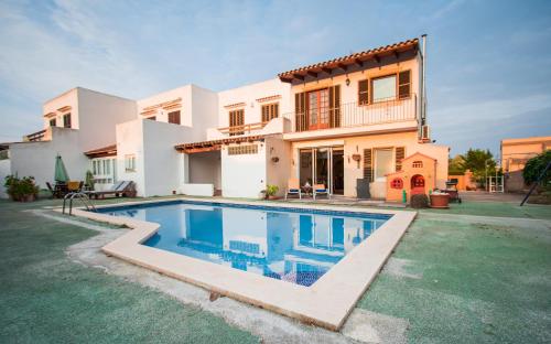 Foto Bonita Casa Suit, Porto Colom, Piscina, AC, Wifi y Netflix 5