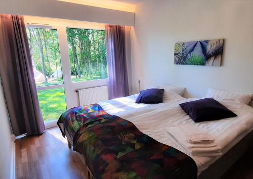 Postel nebo postele na pokoji v ubytování Breanäs Hotell
