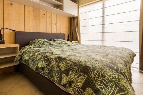 מיטה או מיטות בחדר ב-De Notelaar