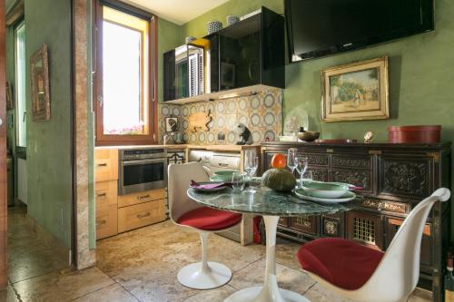 Kuchyňa alebo kuchynka v ubytovaní The Trastevere Penthouse Experience