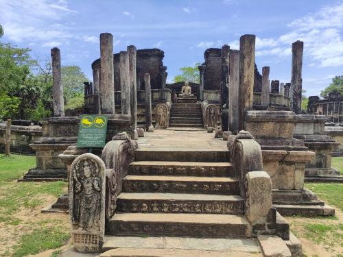 a staircase in a temple in the ruins at Deer Garden Guest in Polonnaruwa